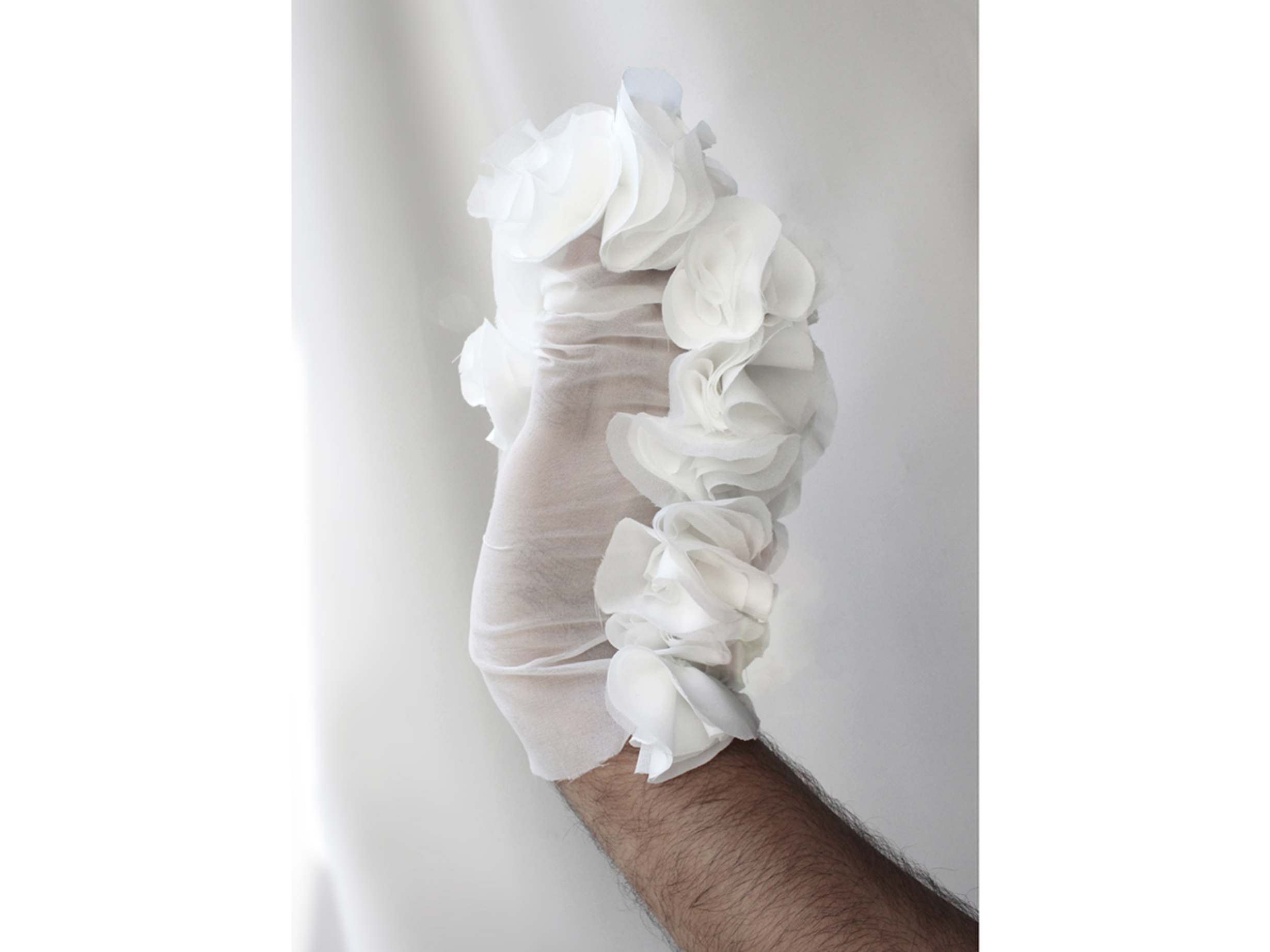 Ruffles are formed by stitching layers of fabric in tension.