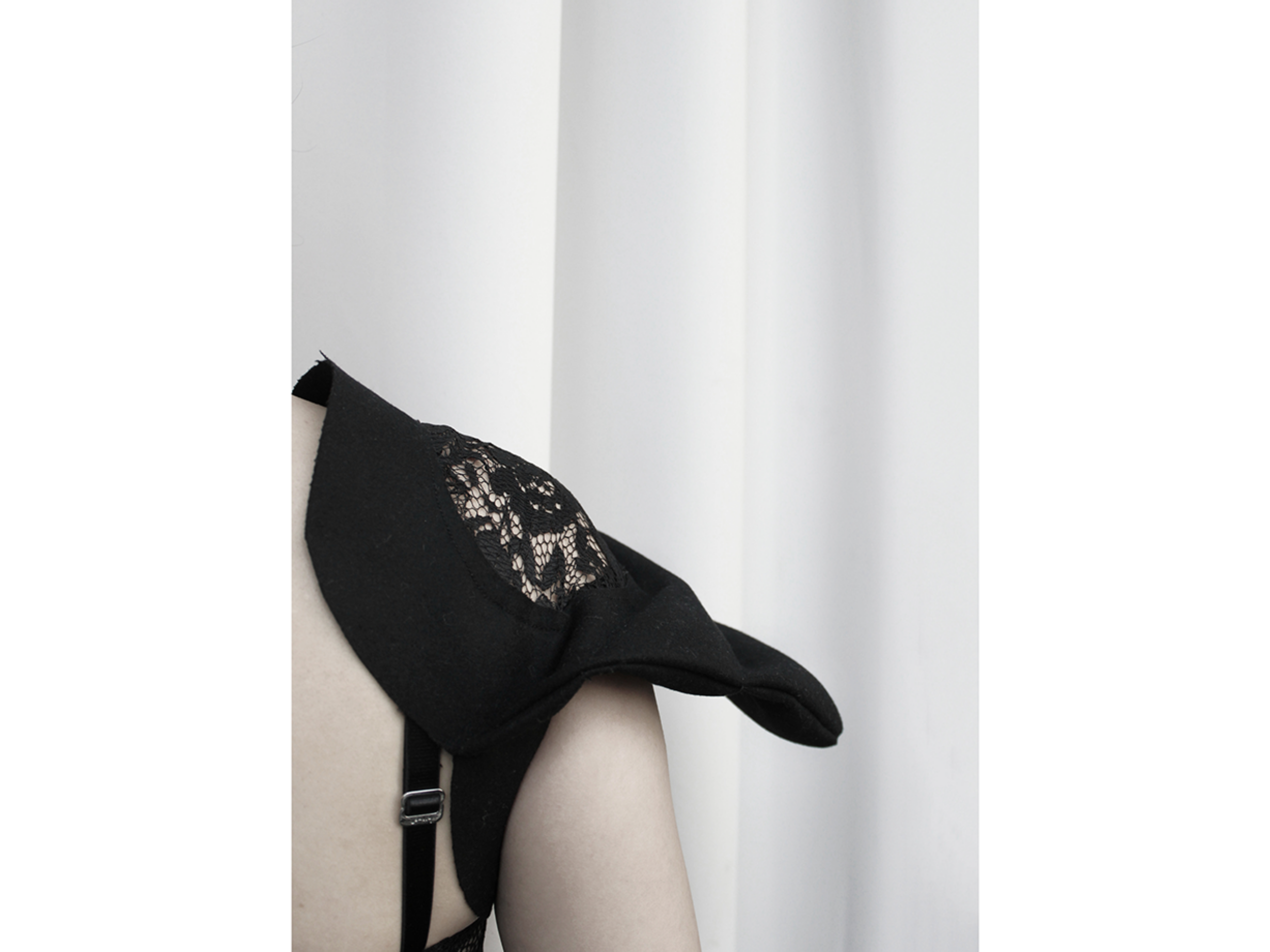 Anti-Shoulder Pad. Lace insert reveals shoulder.